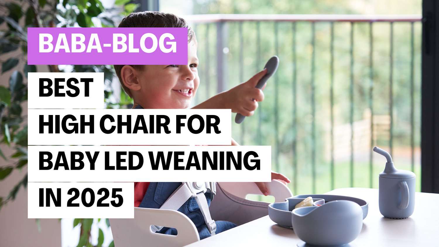 Smiling toddler sitting in a high chair with baby-led weaning plates and cup, pointing excitedly, with text overlay reading ‘Best High Chair for Baby Led Weaning in 2025’.