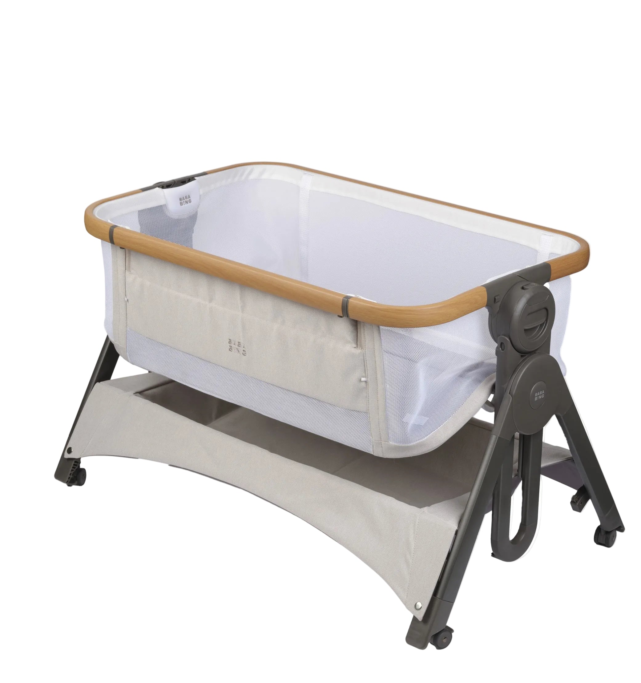 Portable baby crib with wooden sides on a white background