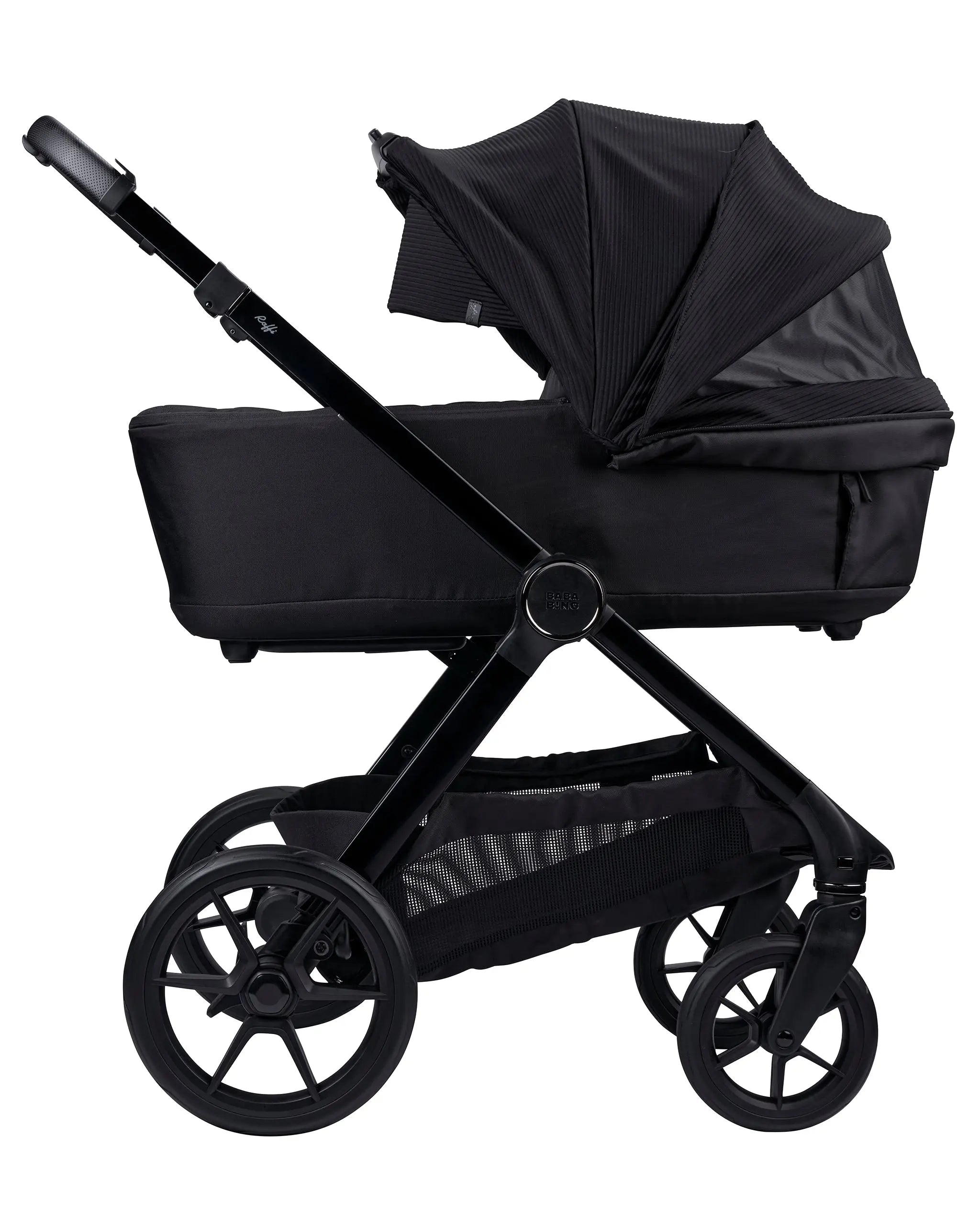 side view of raffi travel system in black with carrycot attached with extendable sun canopy on white background
