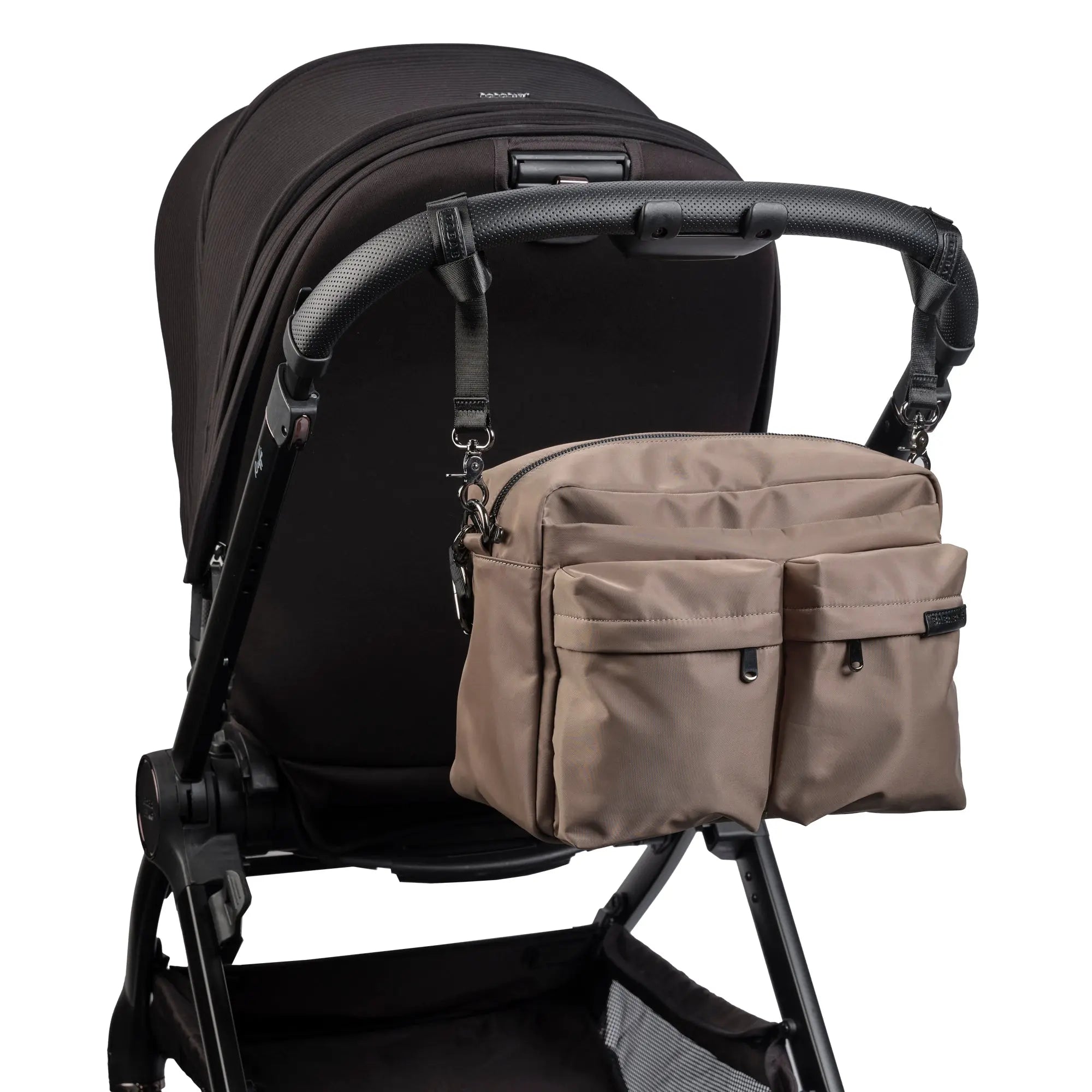 aalia baby changing bag in taupe attached to pushchair