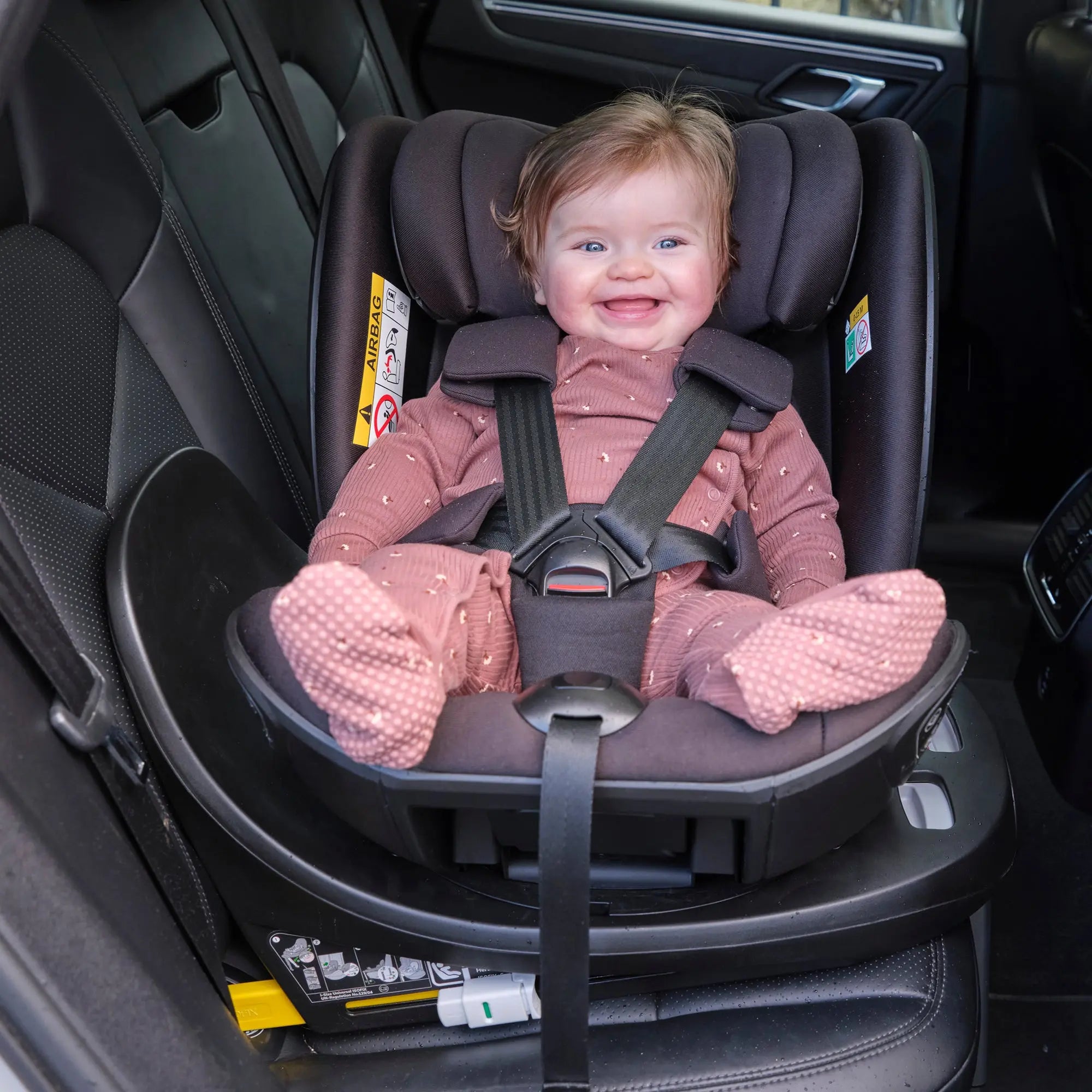 lifestyle image of baby in car seat front view