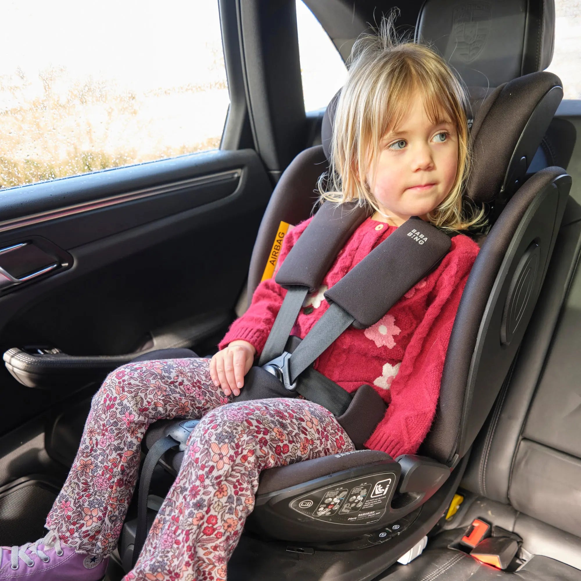 lifestyle image of child in car seat front view