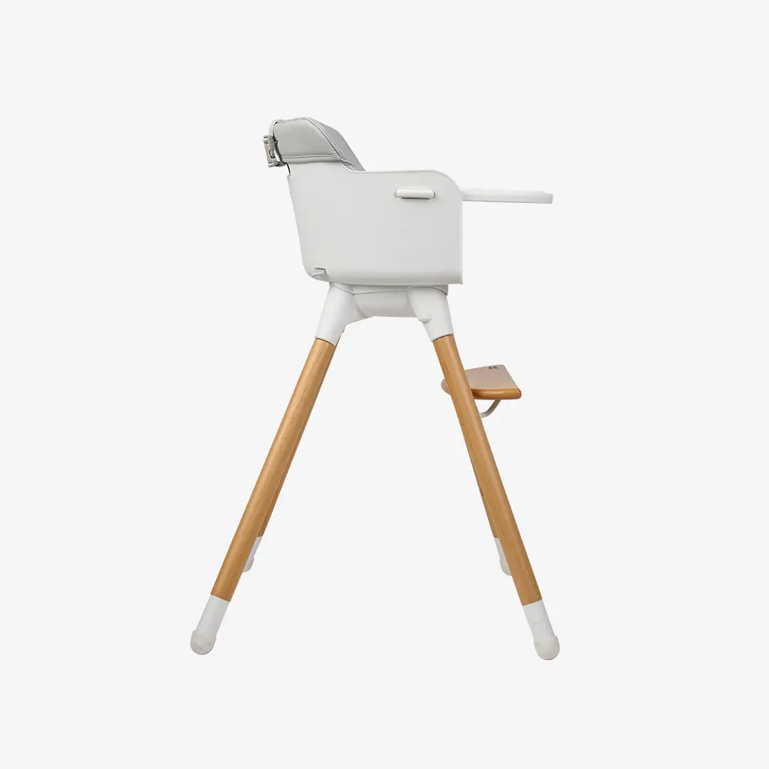 side view of highchair on white background