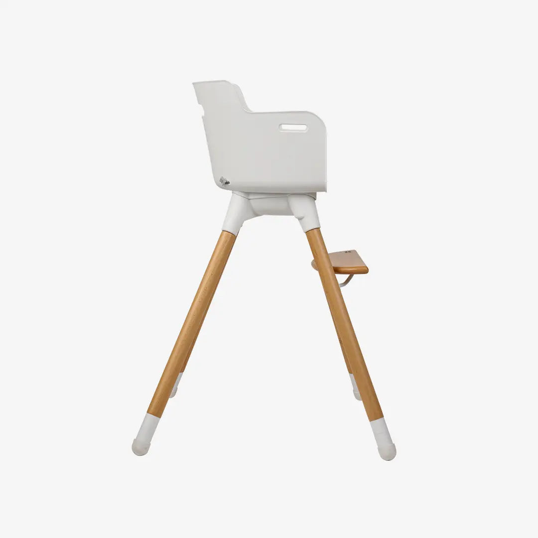side view of highchair on white background