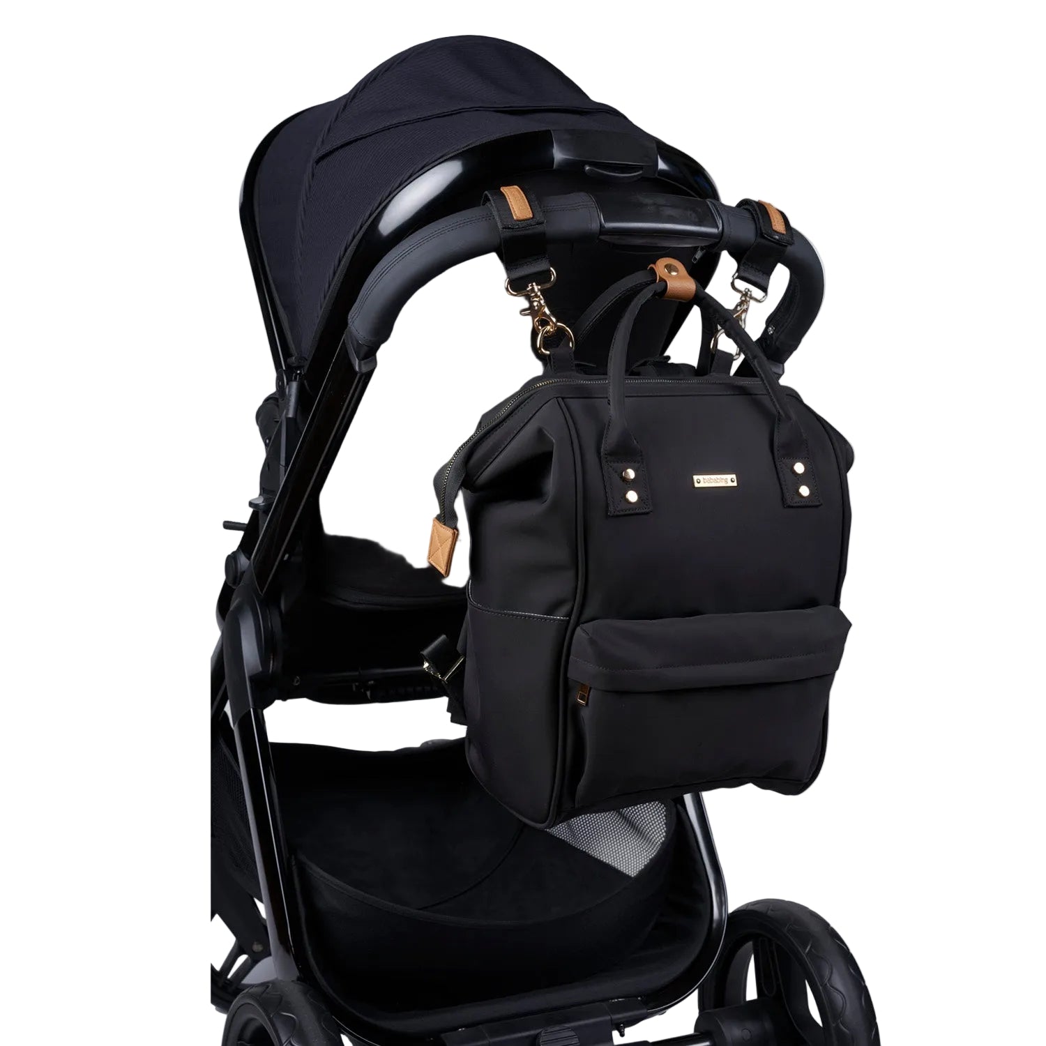 Black stroller with attached black backpack on a white background