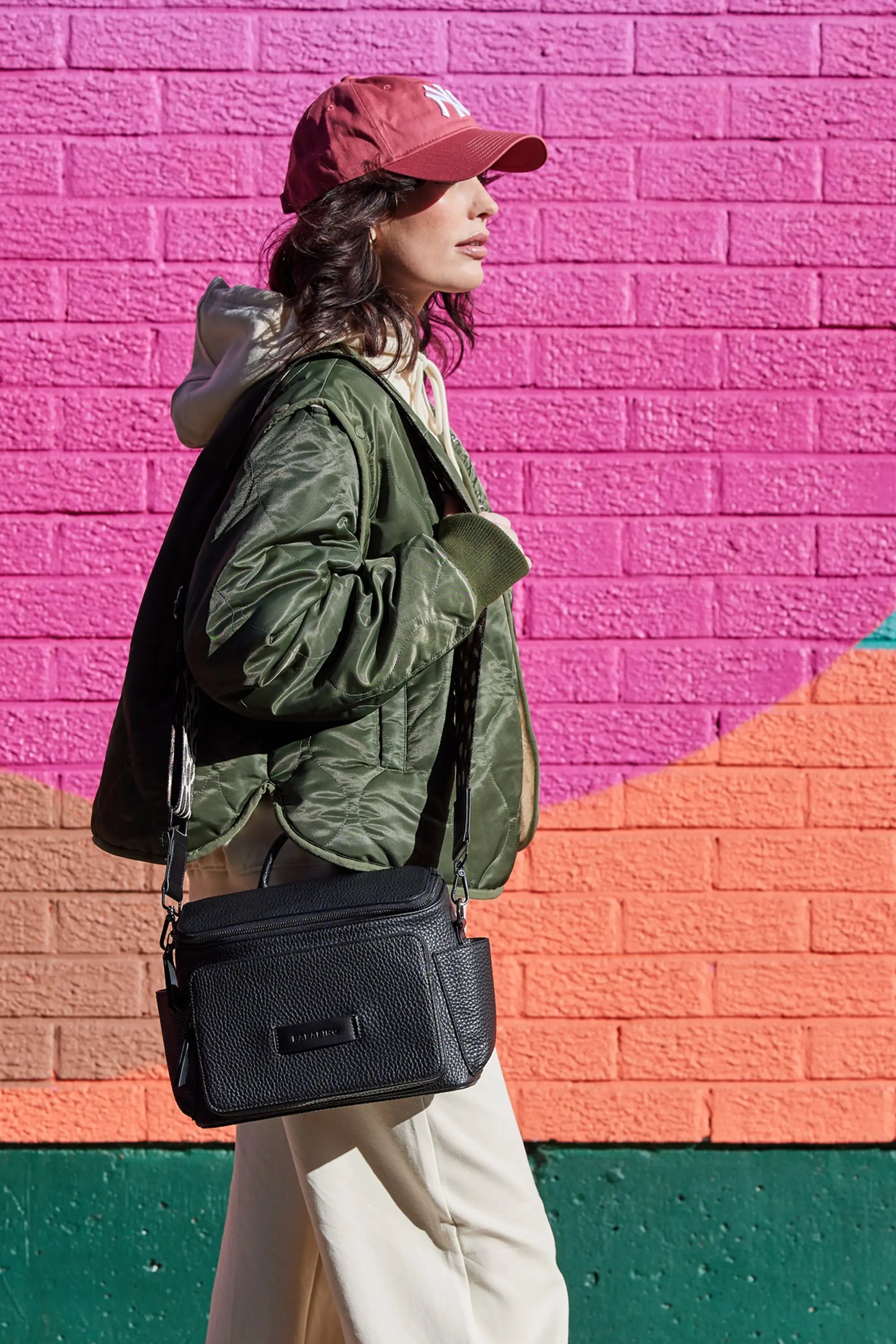 lifestyle image of the isla changing bag being worn