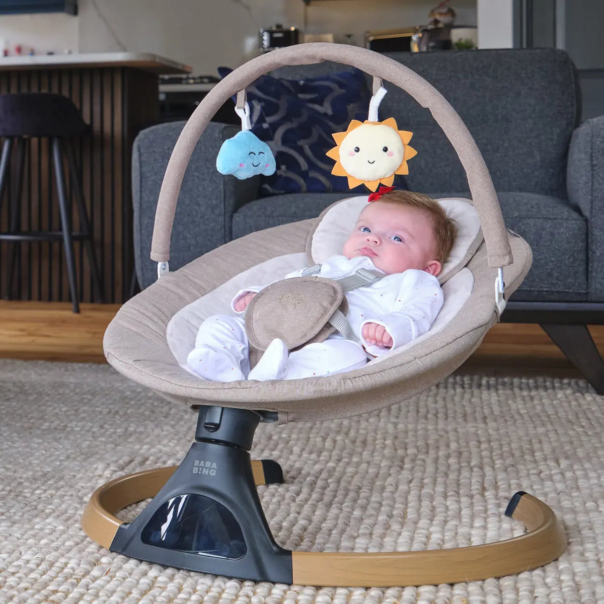 baby in an electric swing