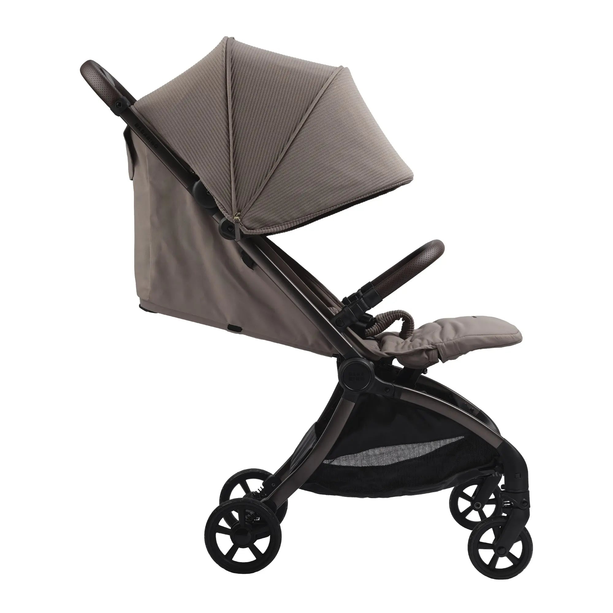 side view of compact pushchair with extended sun canopy in minky colour